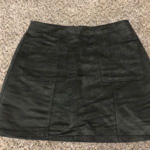 Dark green faux suede skirt with pockets and zips
